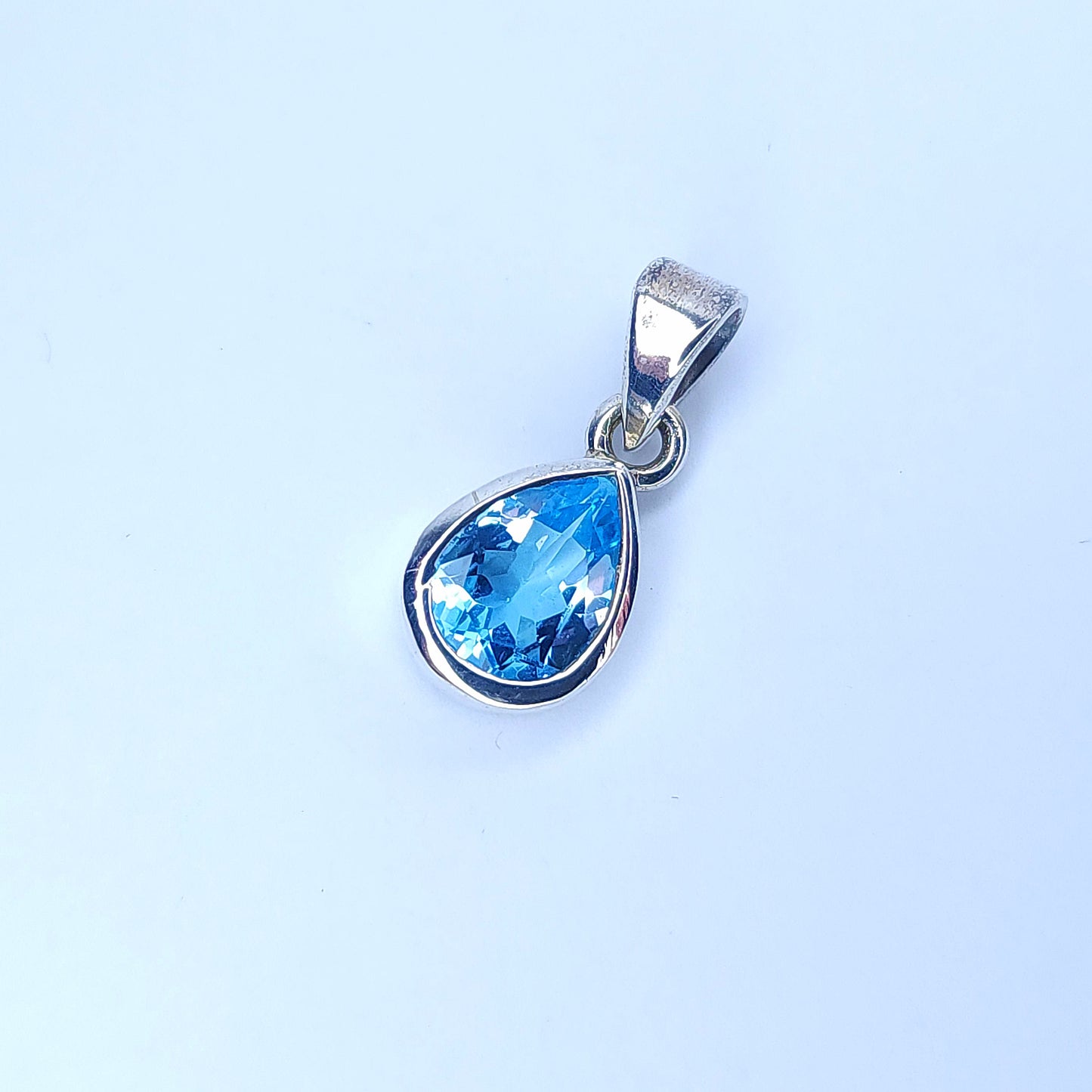 Dainty Blue Topaz in Silver Pendant