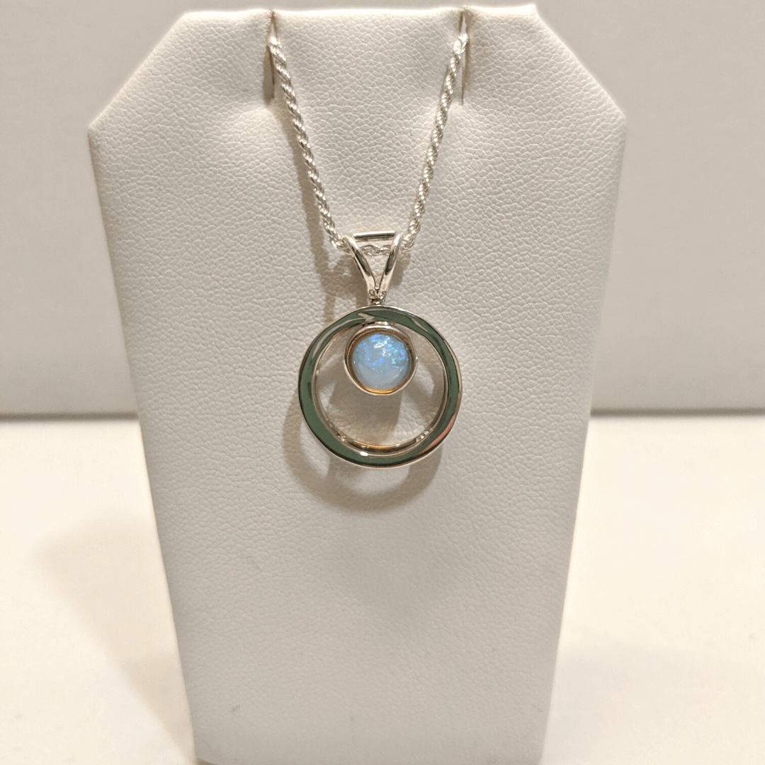 Ethiopian Opal Pendant in Silver Circle