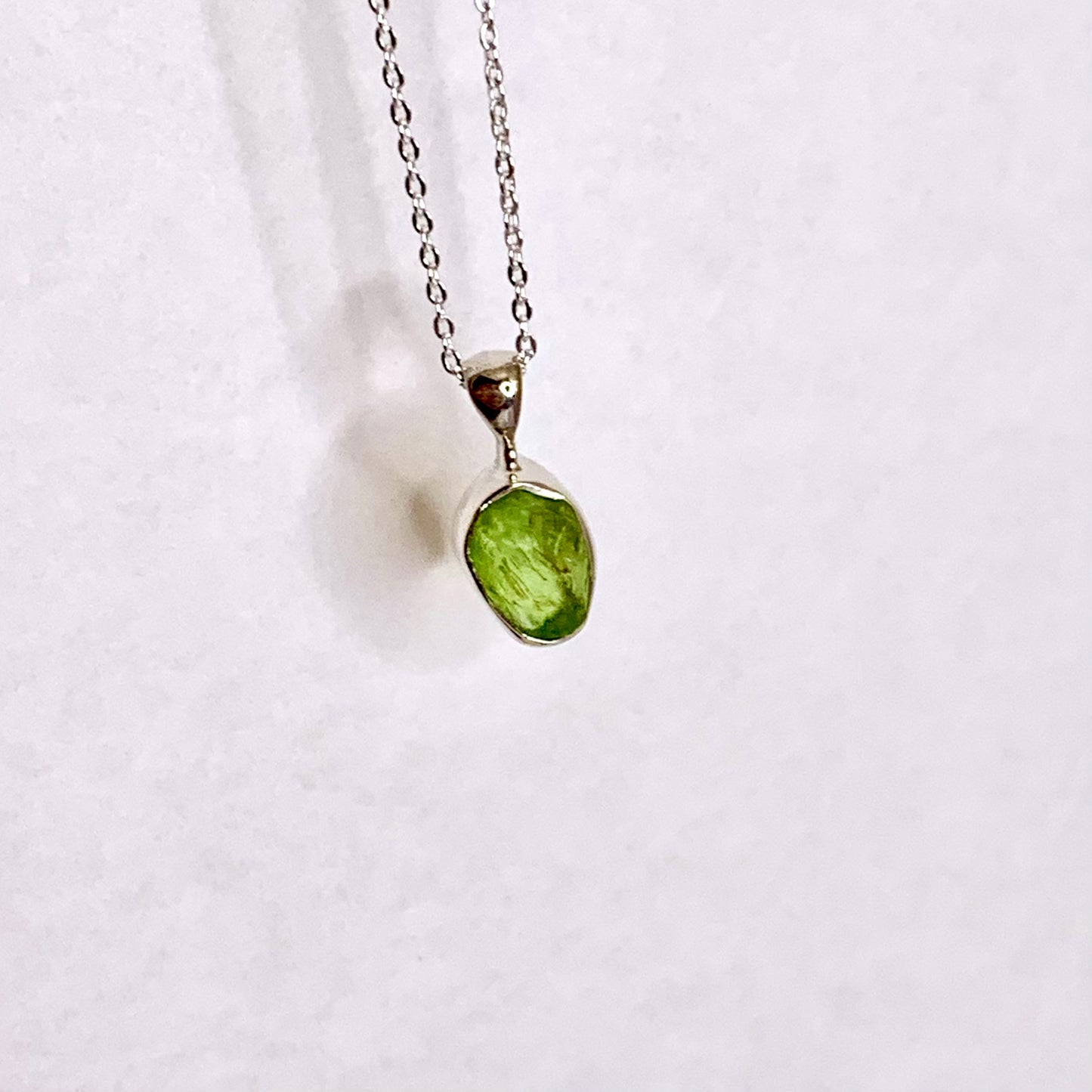 Raw Peridot and Silver Pendant