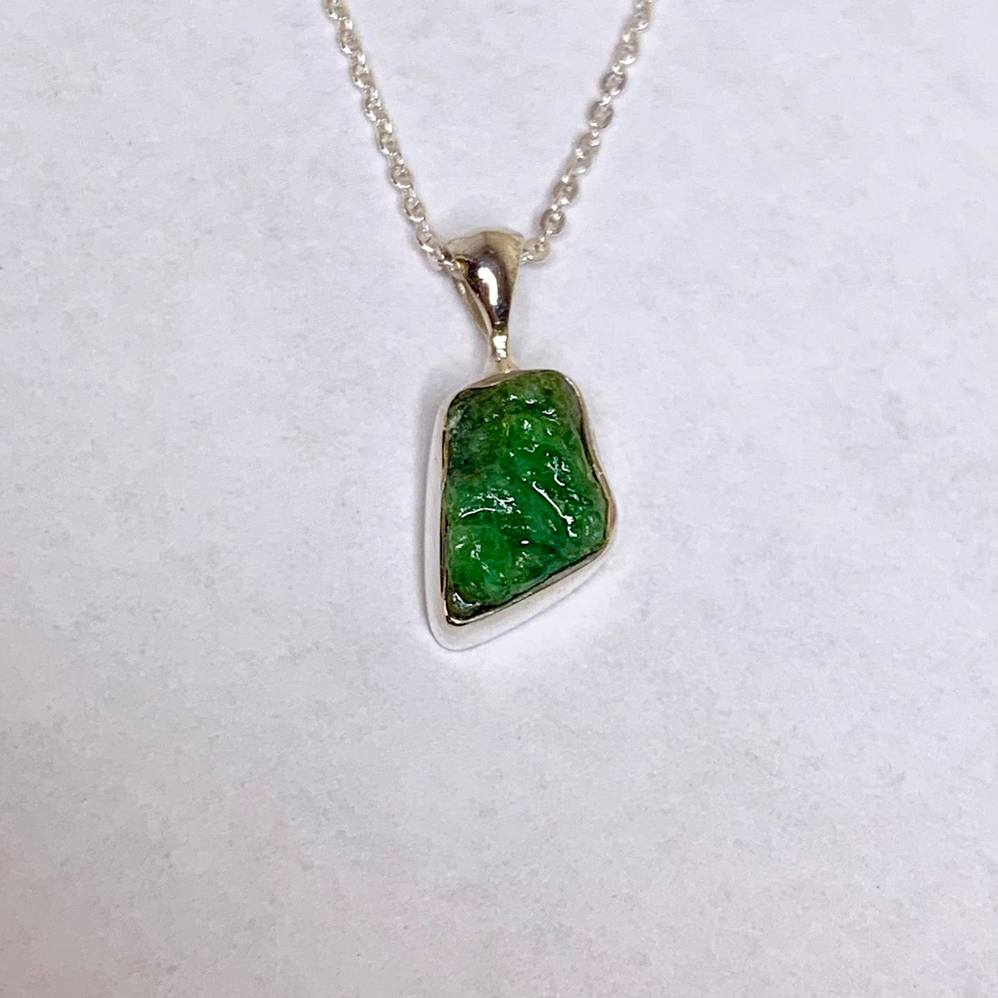 Raw Emerald and Silver Pendant