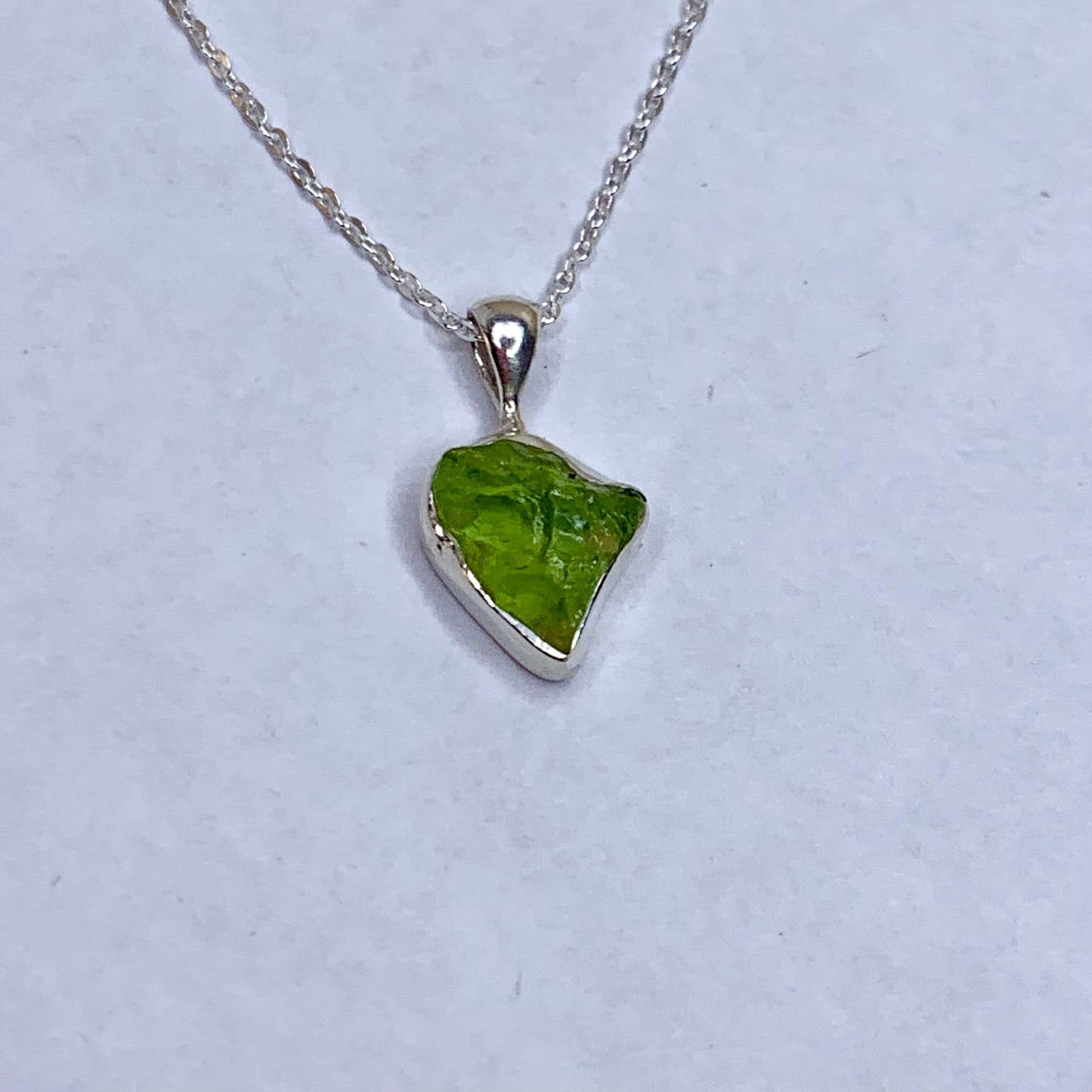 Raw Peridot and Silver Pendant